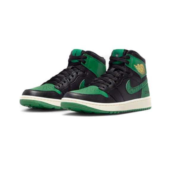 Black and green high-top sneakers on a white background