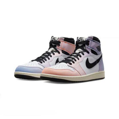 Pair of high-top sneakers with a brand logo on a white background
